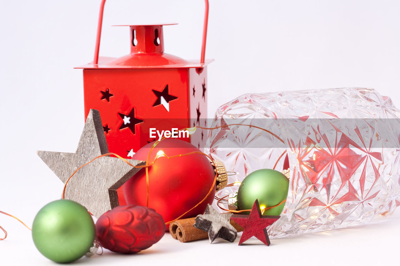 Close-up of christmas decoration against white background