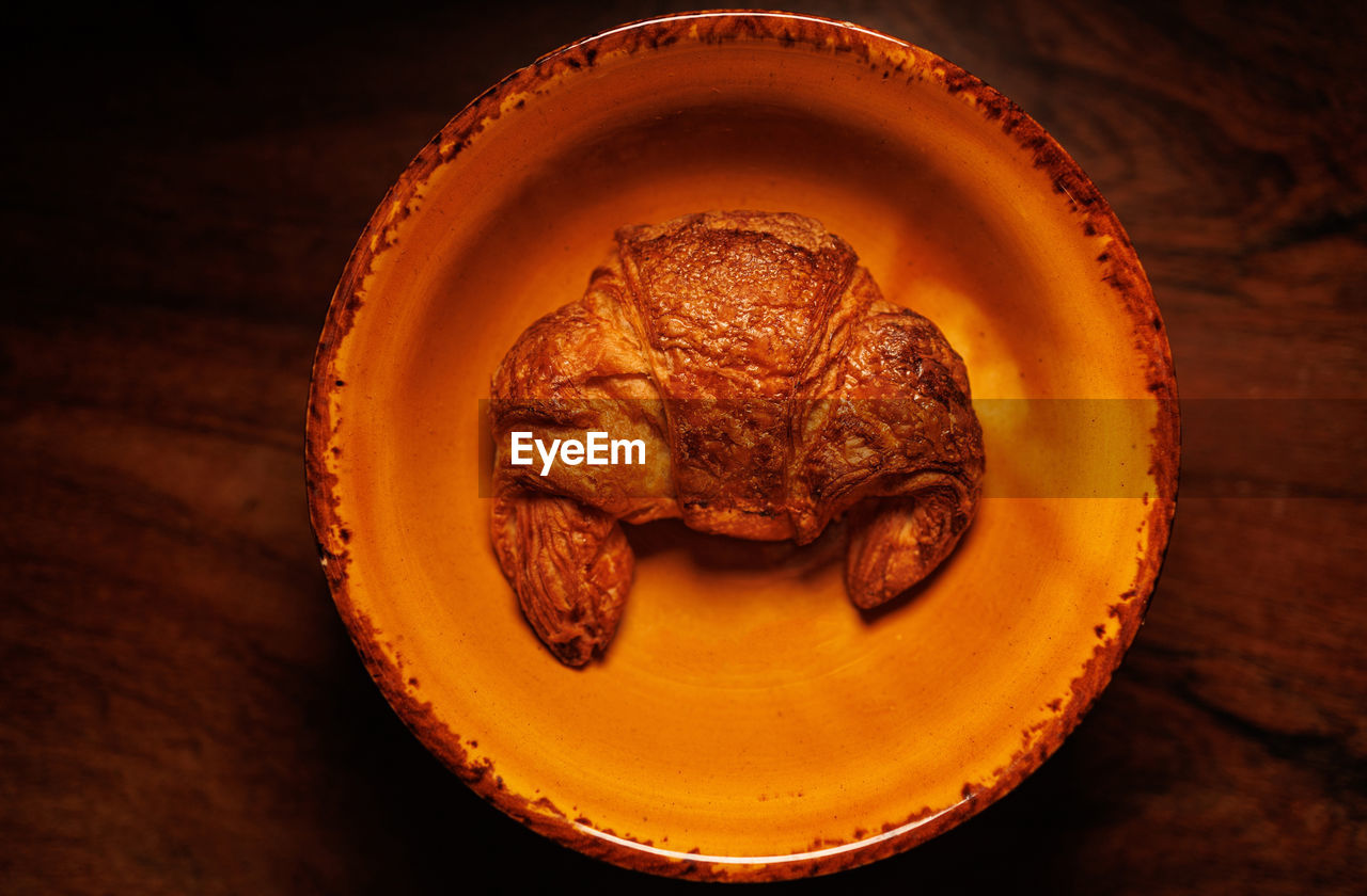 High angle view of french croissant on table