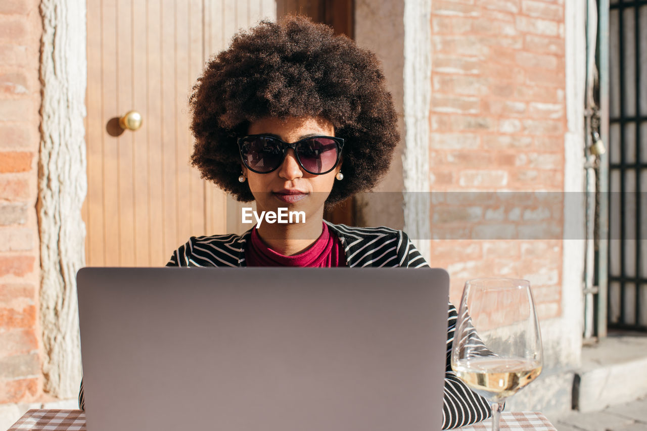 Young freelancer woman using laptop computer