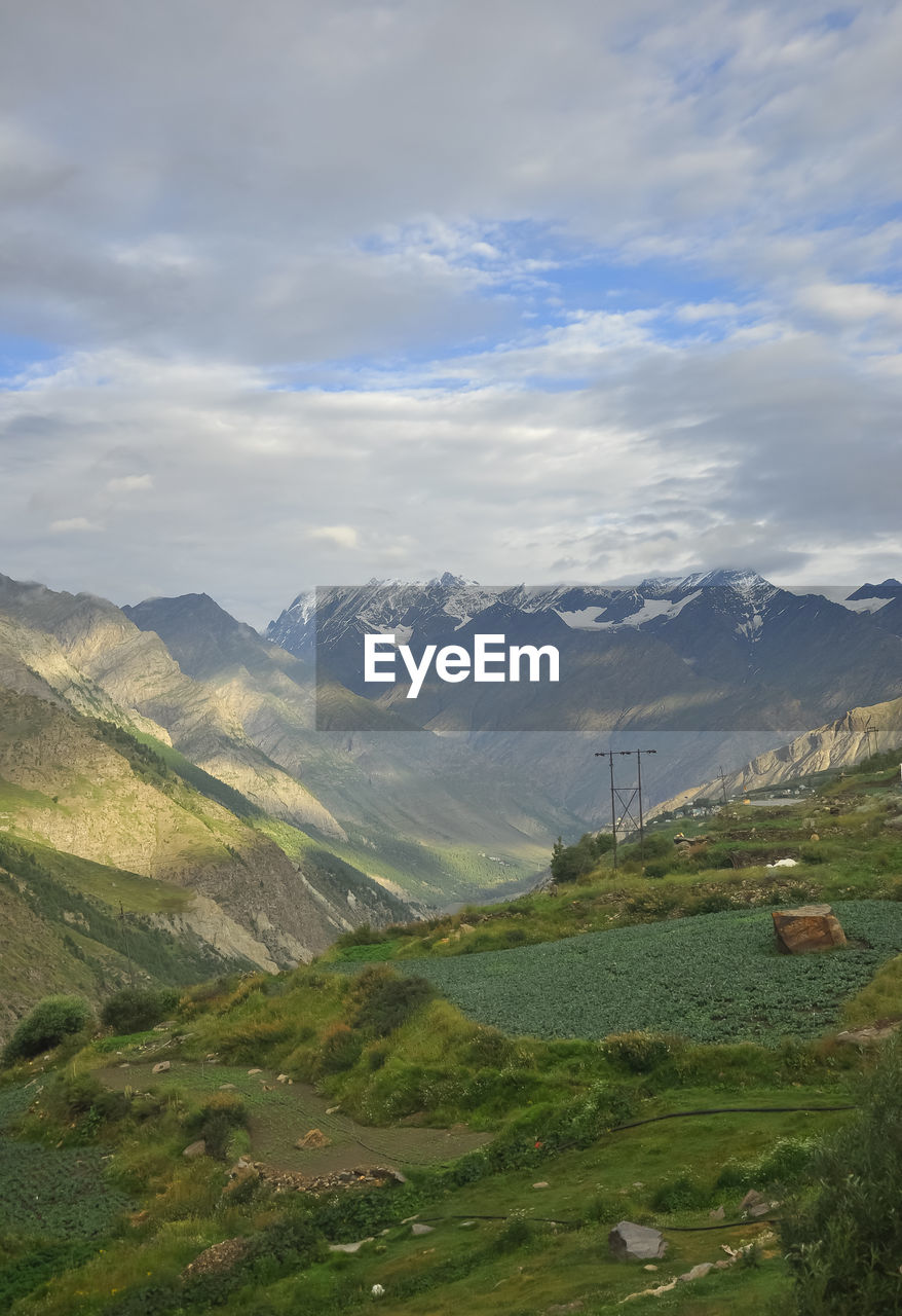 Morning view of glacier mountains from beautiful village in lahaul and spiti, himachal pradesh