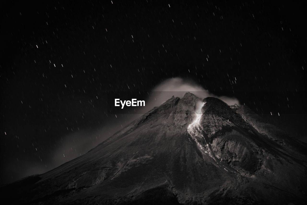 darkness, night, mountain, star, scenics - nature, beauty in nature, space, nature, astronomy, volcano, environment, no people, sky, landscape, land, astronomical object, outer space, outdoors, geology, science, galaxy, non-urban scene, space and astronomy