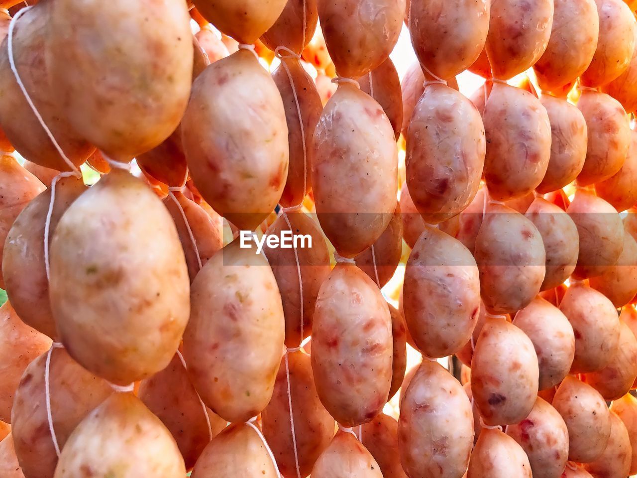 Full frame shot of meat hanging in market for sale