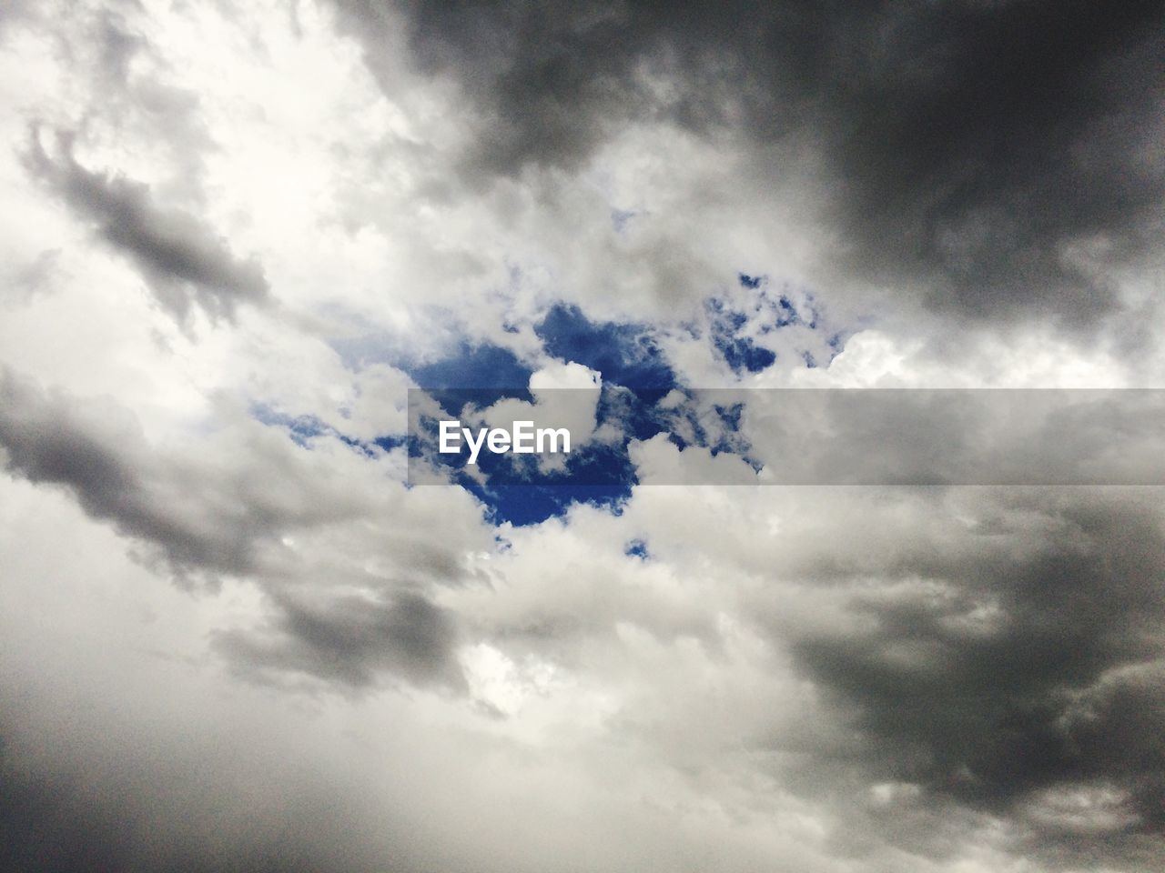 Low angle view of clouds forming heart shape