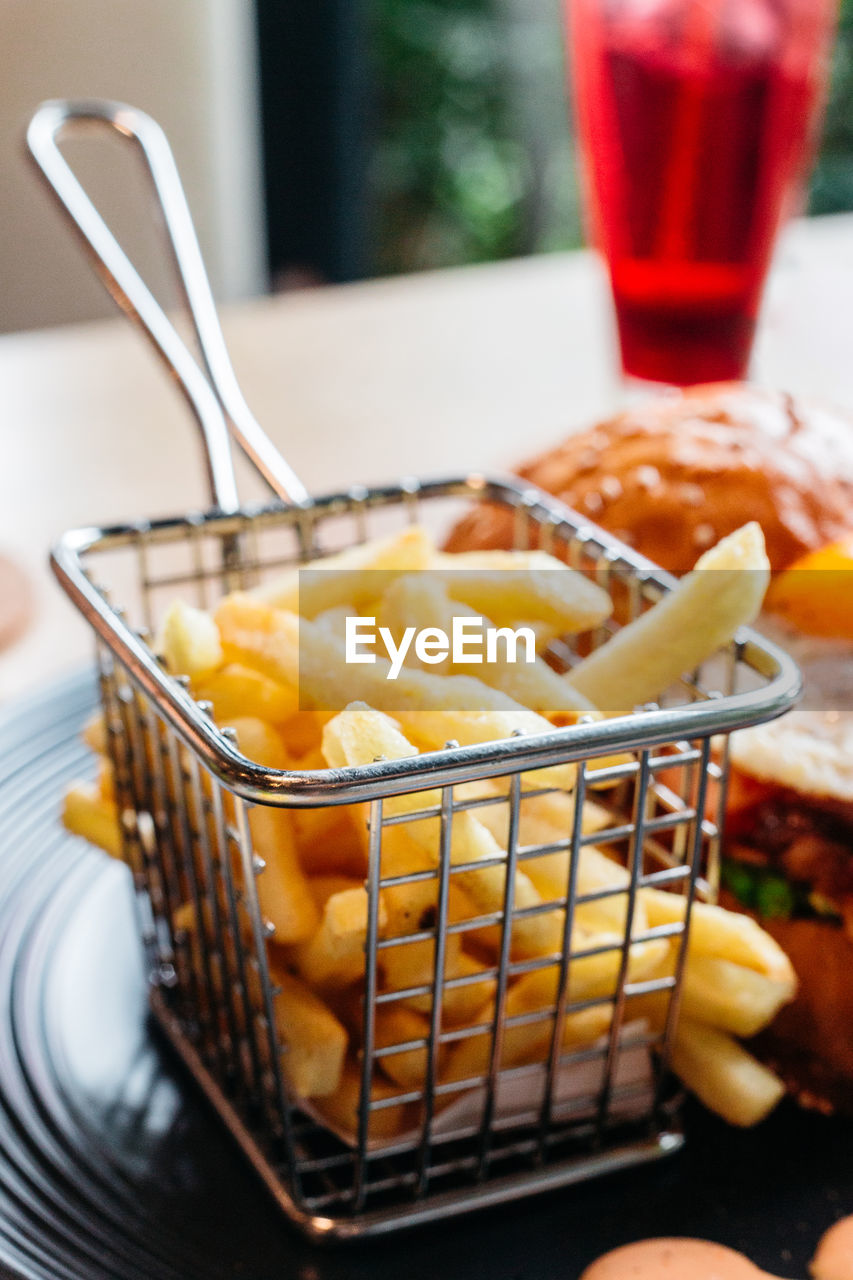 CLOSE-UP OF FOOD IN BASKET