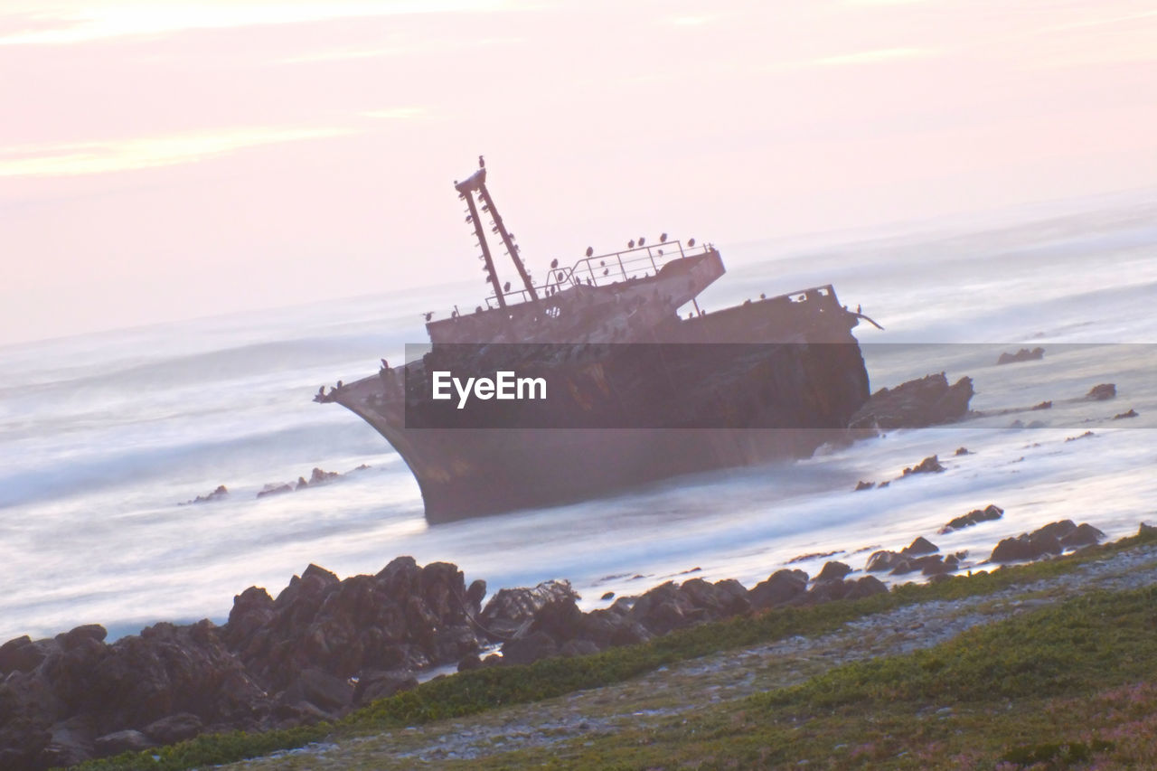 ABANDONED SHIP ON BEACH