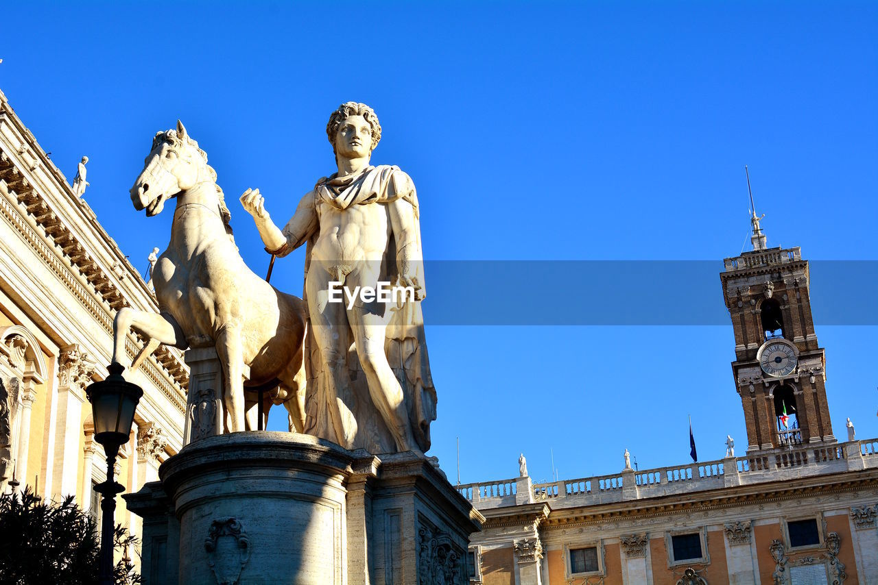 LOW ANGLE VIEW OF STATUE OF BUILDING