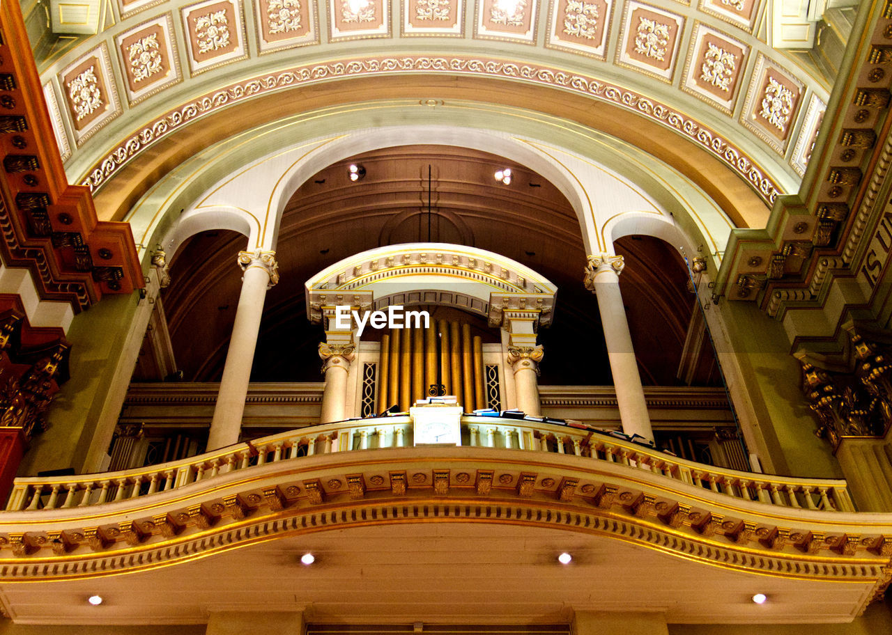 LOW ANGLE VIEW OF ILLUMINATED BUILDING IN CEILING