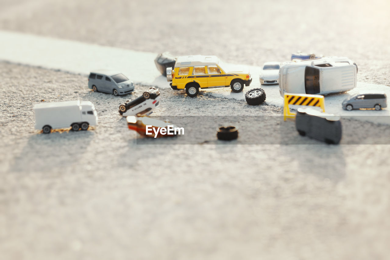 Close-up of toy car on road