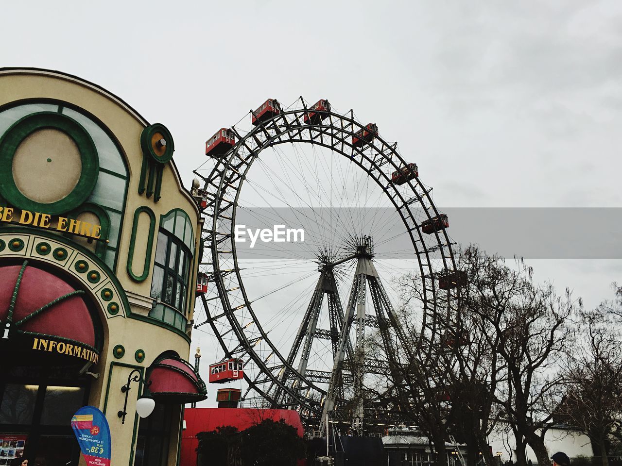 Low angle view of ferris wheel against sky