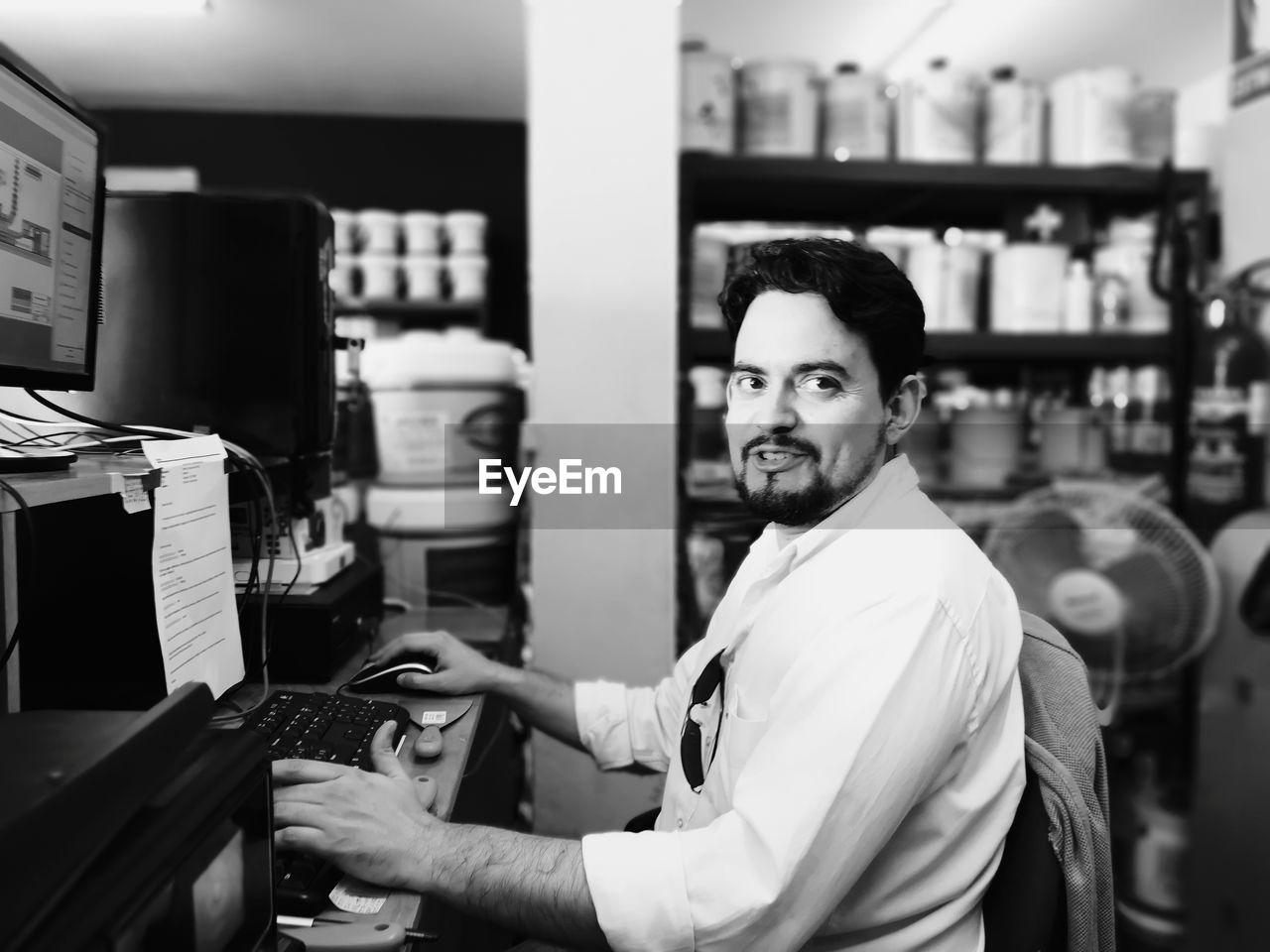 Portrait of smiling man working in office