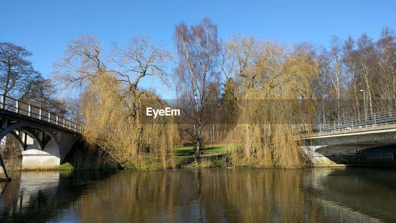 VIEW OF BRIDGE OVER RIVER AGAINST SKY