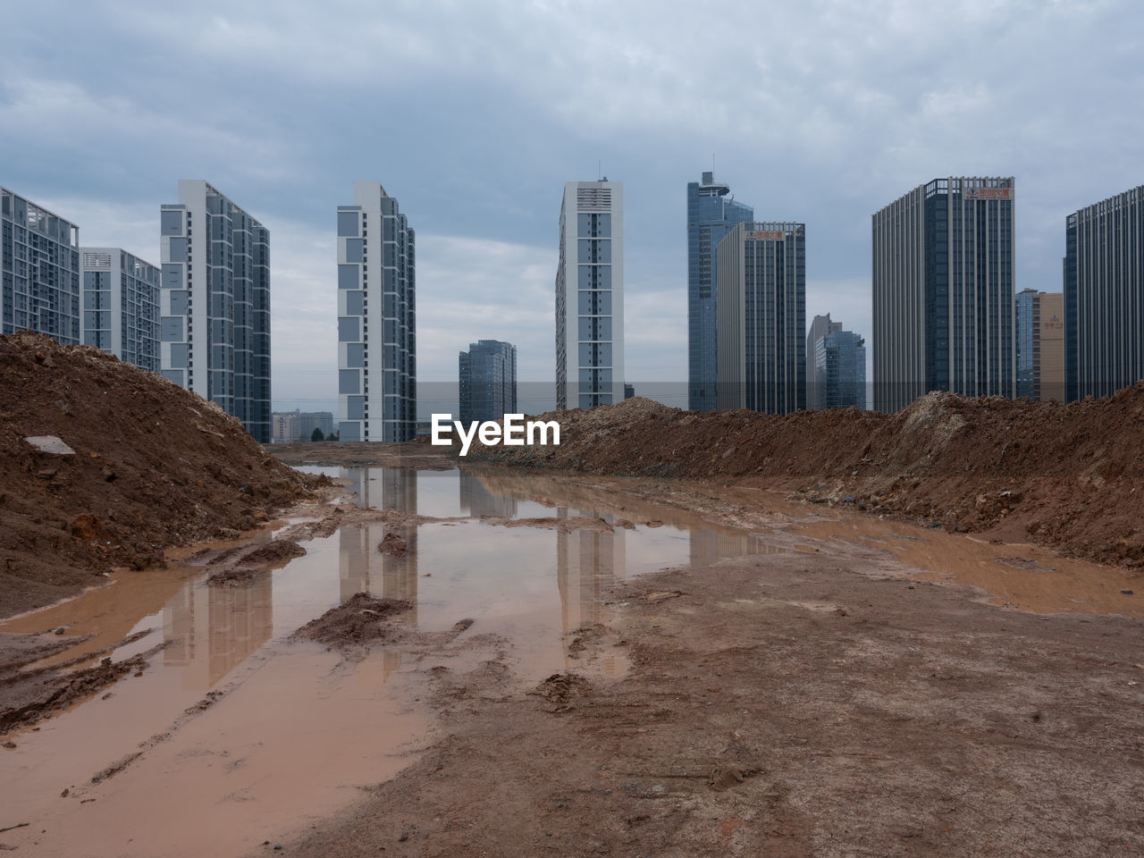 Buildings in city against sky