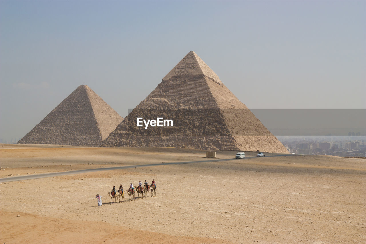 High angle view of pyramid at desert against sky during sunny day