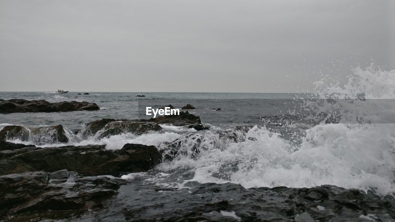 Scenic view of sea against clear sky