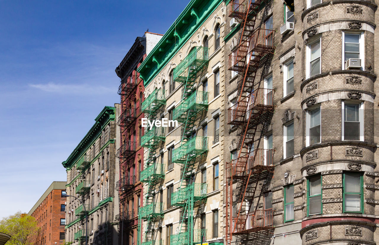 Low angle view of residential building against sky