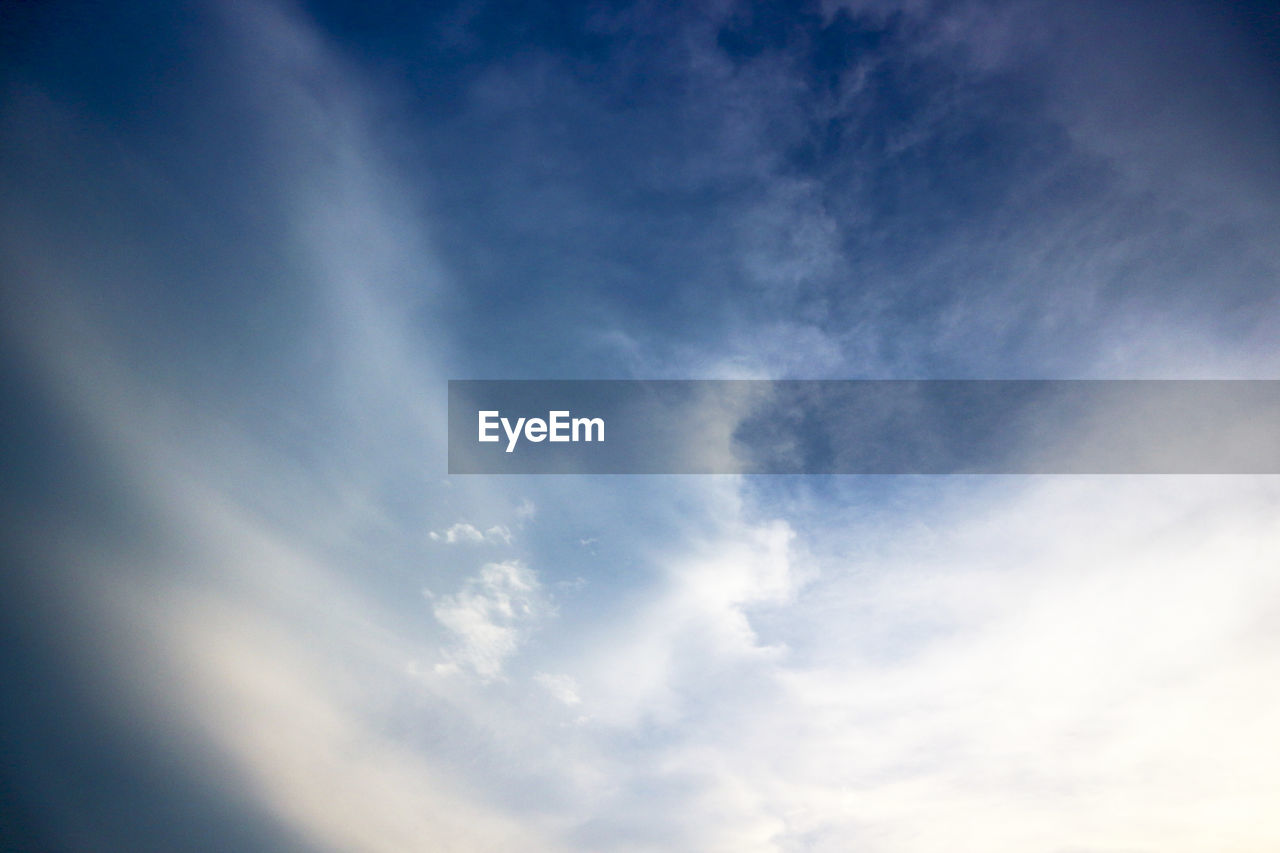 LOW ANGLE VIEW OF CLOUDS IN BLUE SKY