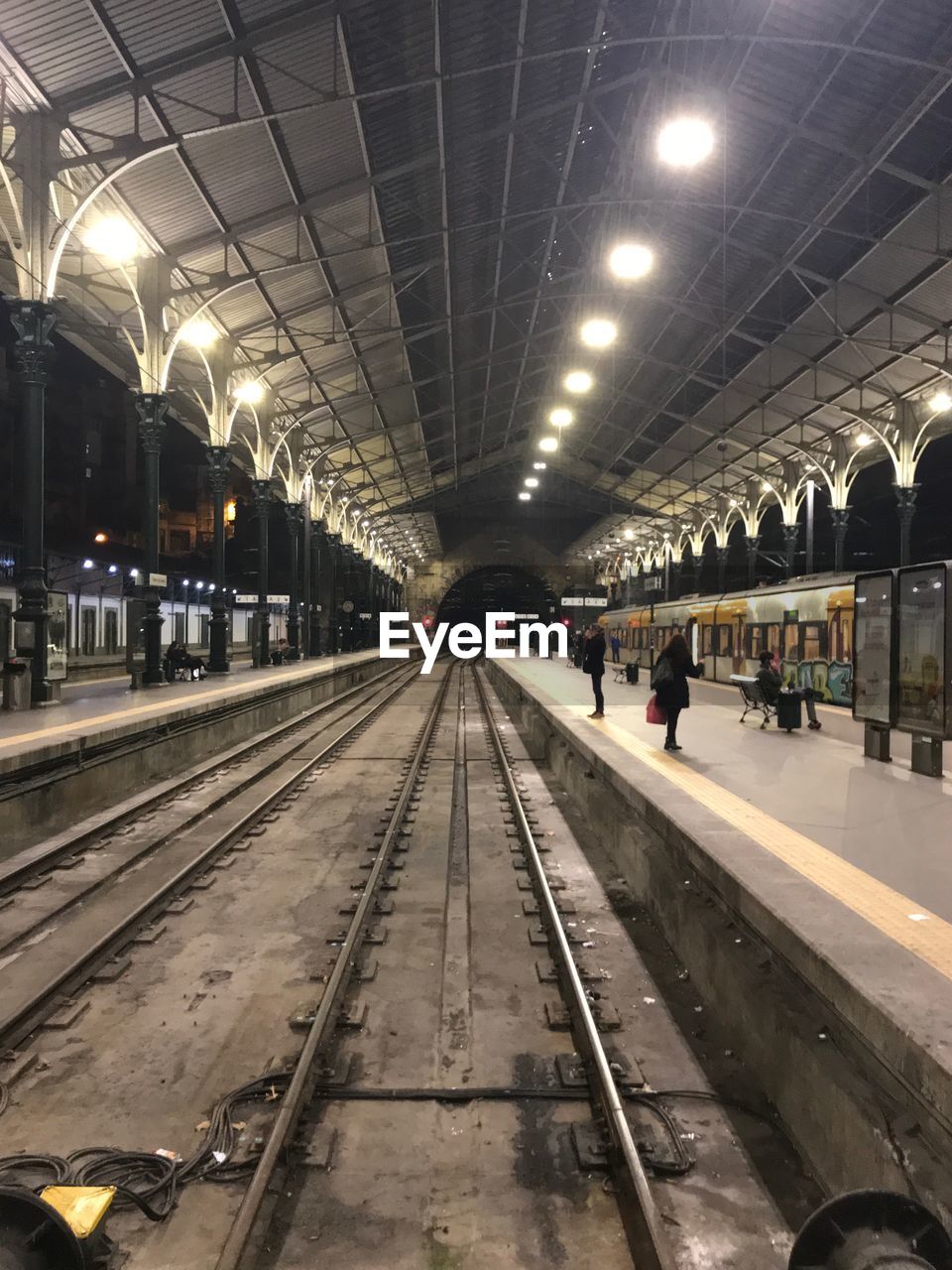 TRAIN AT RAILROAD STATION PLATFORM