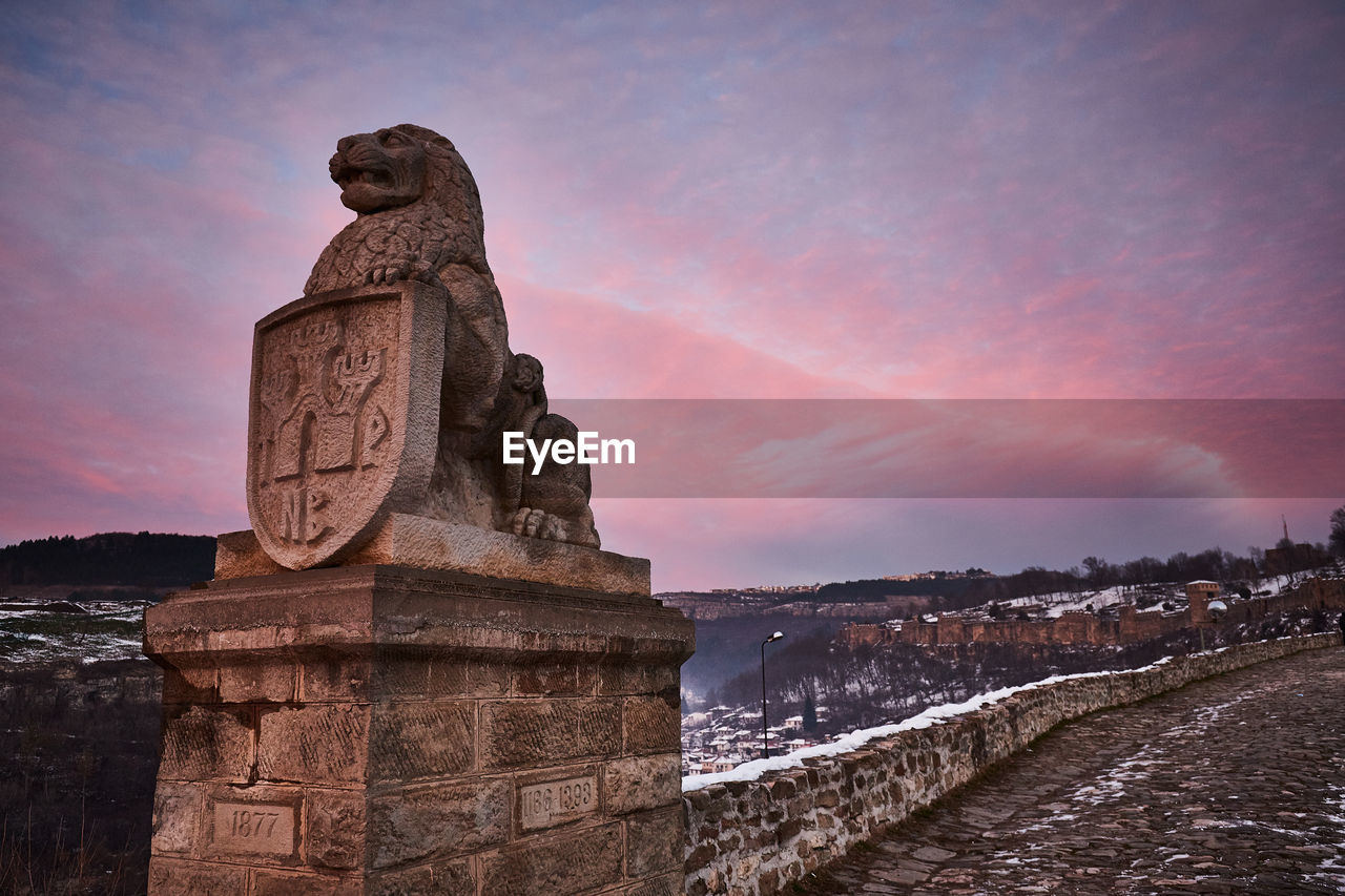 Sunset over the lion gate of tsarevets, the medieval bulgarian capital