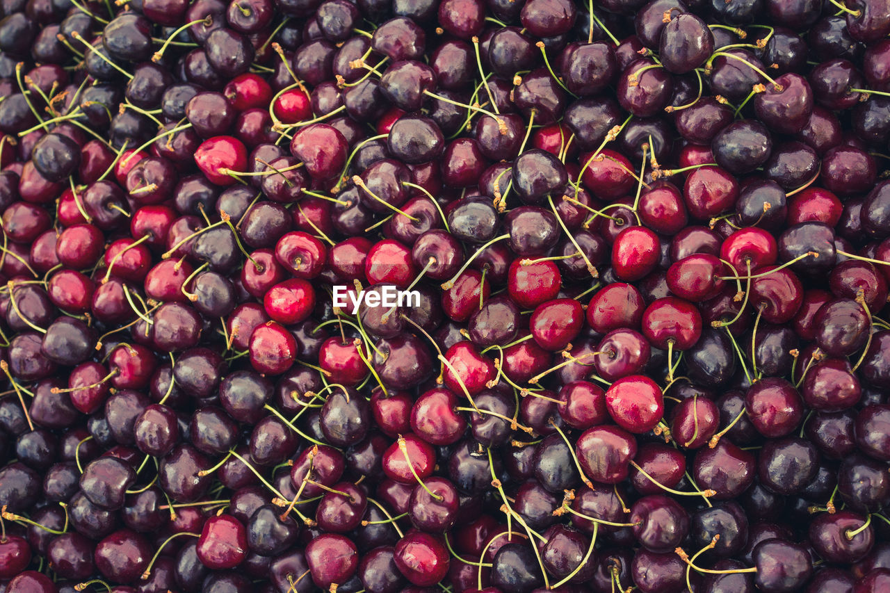 Full frame shot of cherries for sale at market