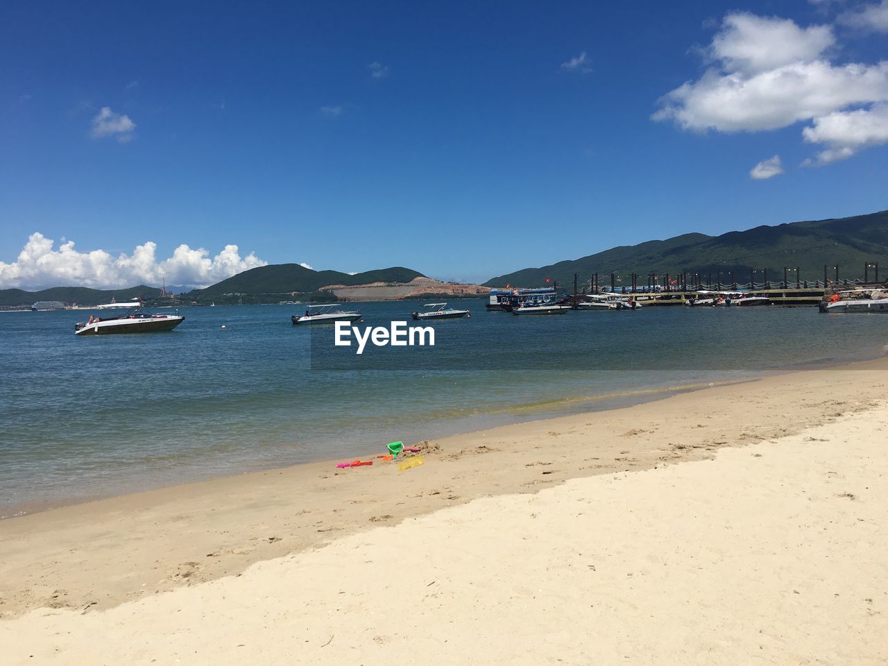 SCENIC VIEW OF BAY AGAINST SKY