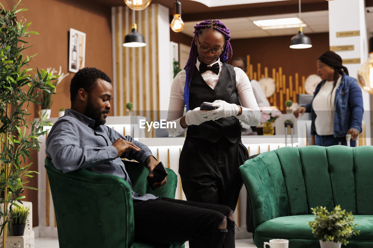 portrait of doctor examining patient in office