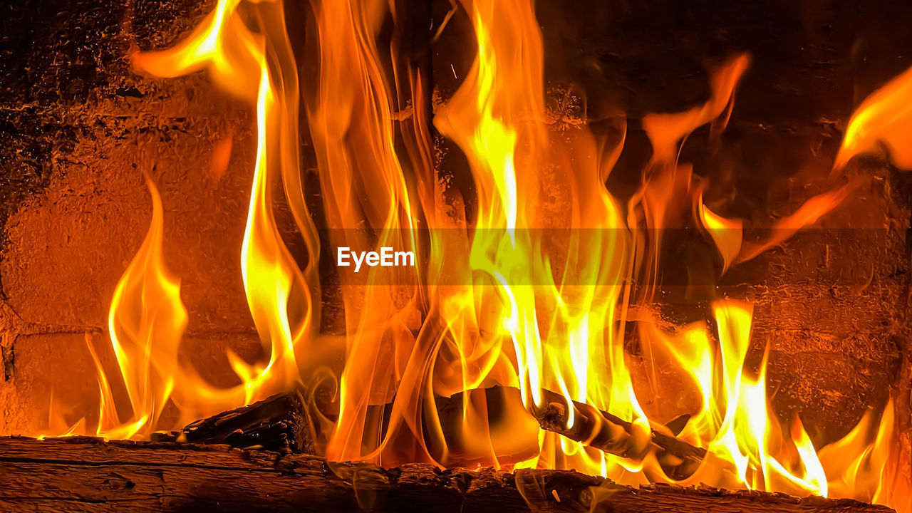 burning, fire, flame, heat, fireplace, nature, orange color, wood, campfire, no people, bonfire, log, yellow, motion, glowing, communication, firewood, sign, night, close-up, warning sign, font, outdoors