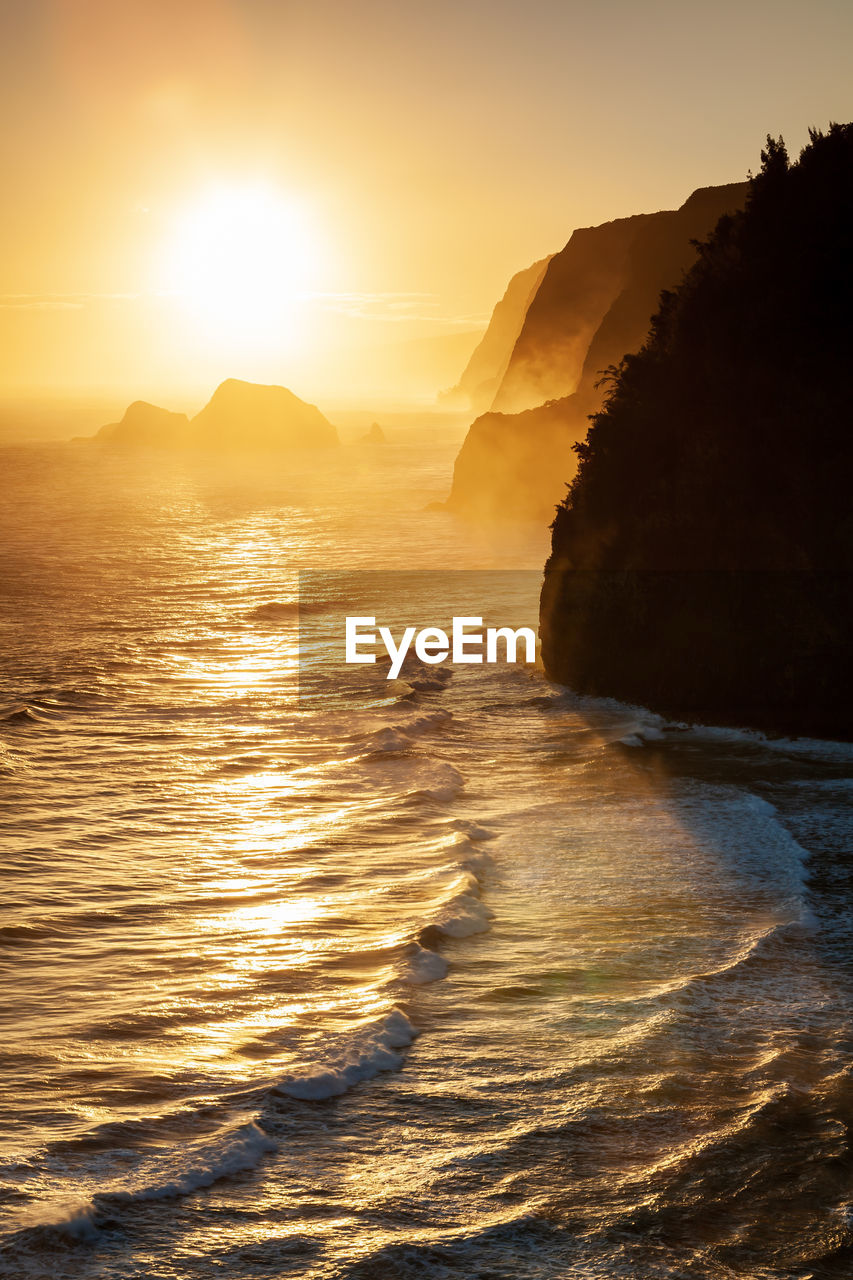 Scenic view of sea against sky during sunset