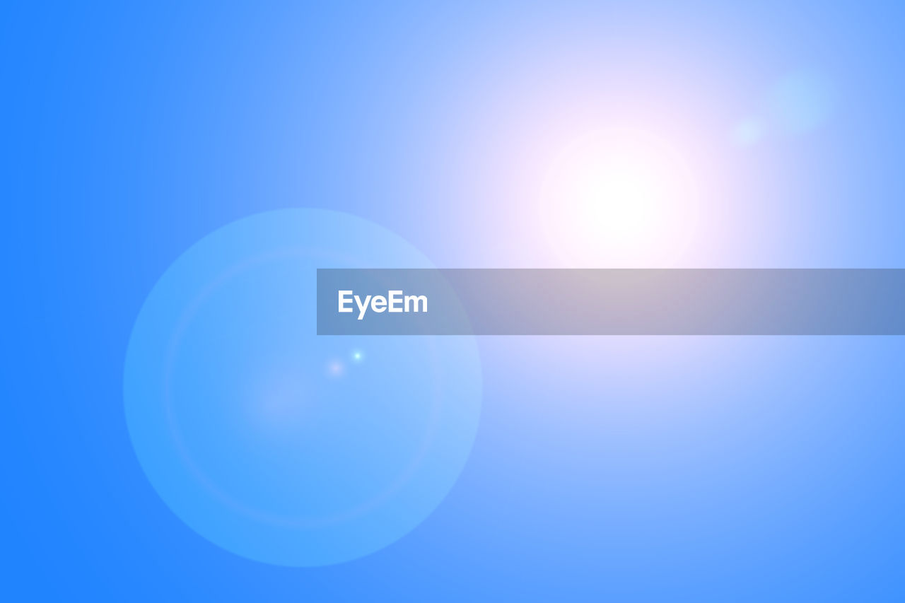 LOW ANGLE VIEW OF BRIGHT SUN