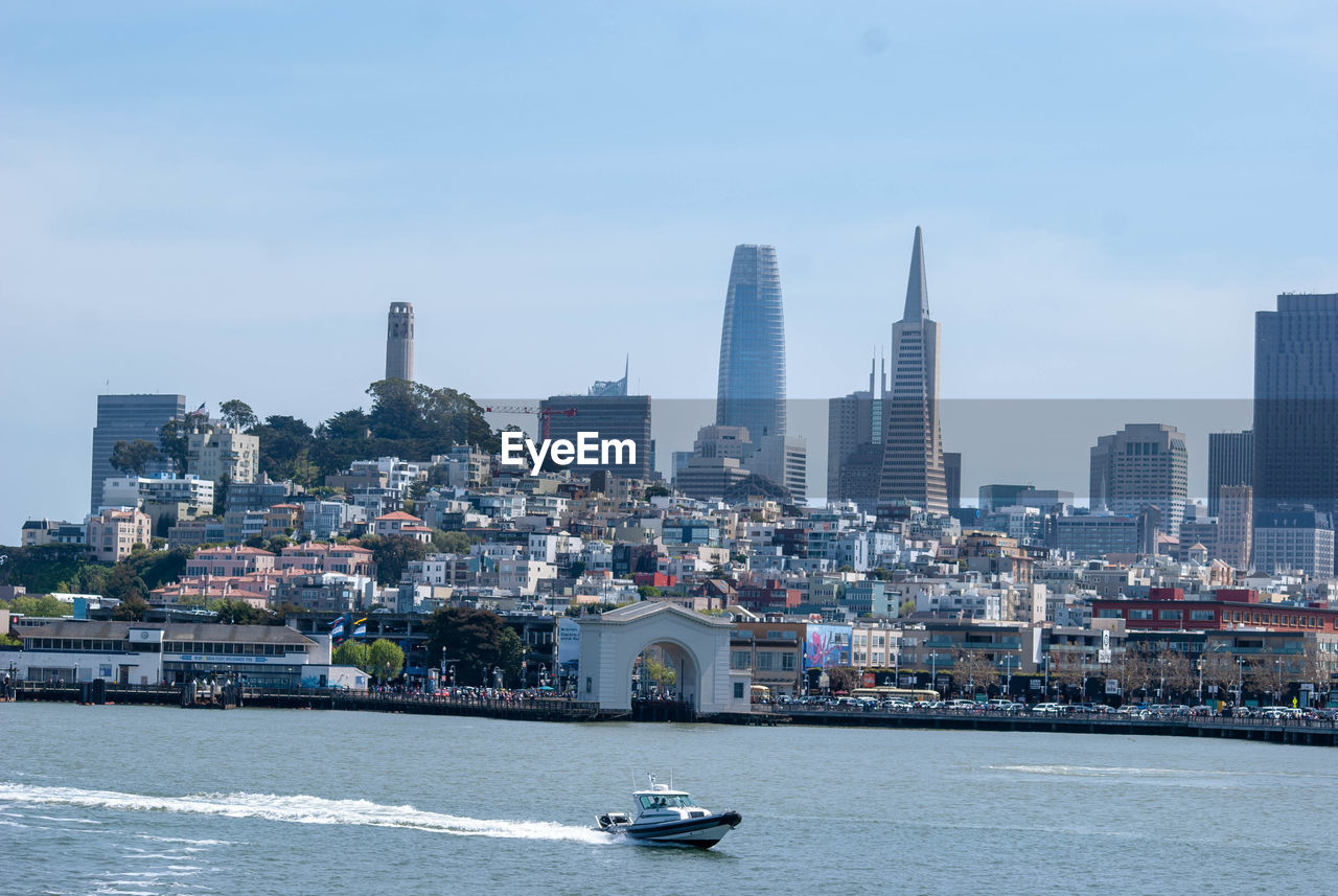 VIEW OF BUILDINGS AT WATERFRONT