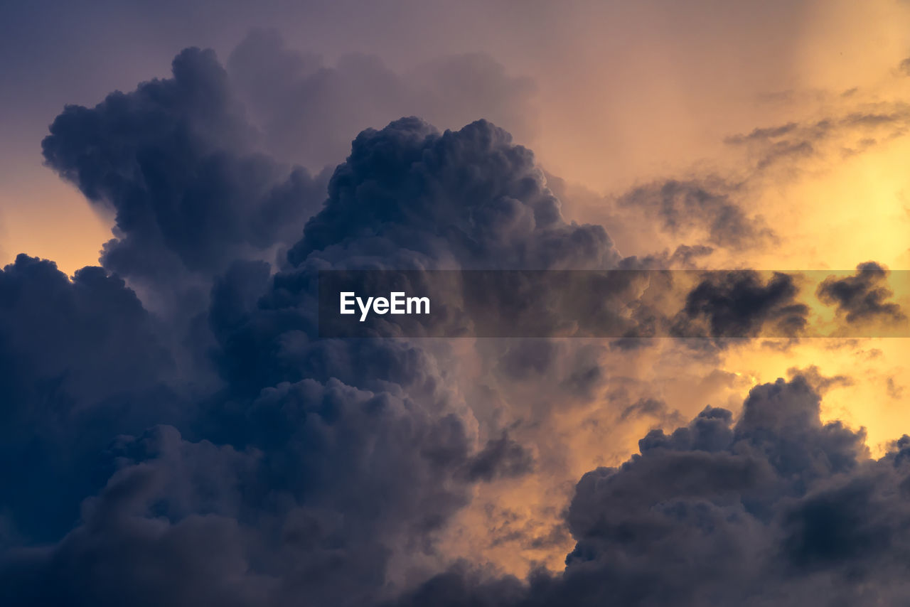 Low angle view of dramatic sky during sunset