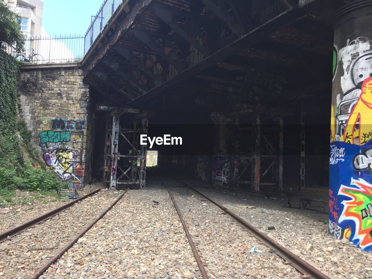 GRAFFITI ON RAILROAD STATION PLATFORM