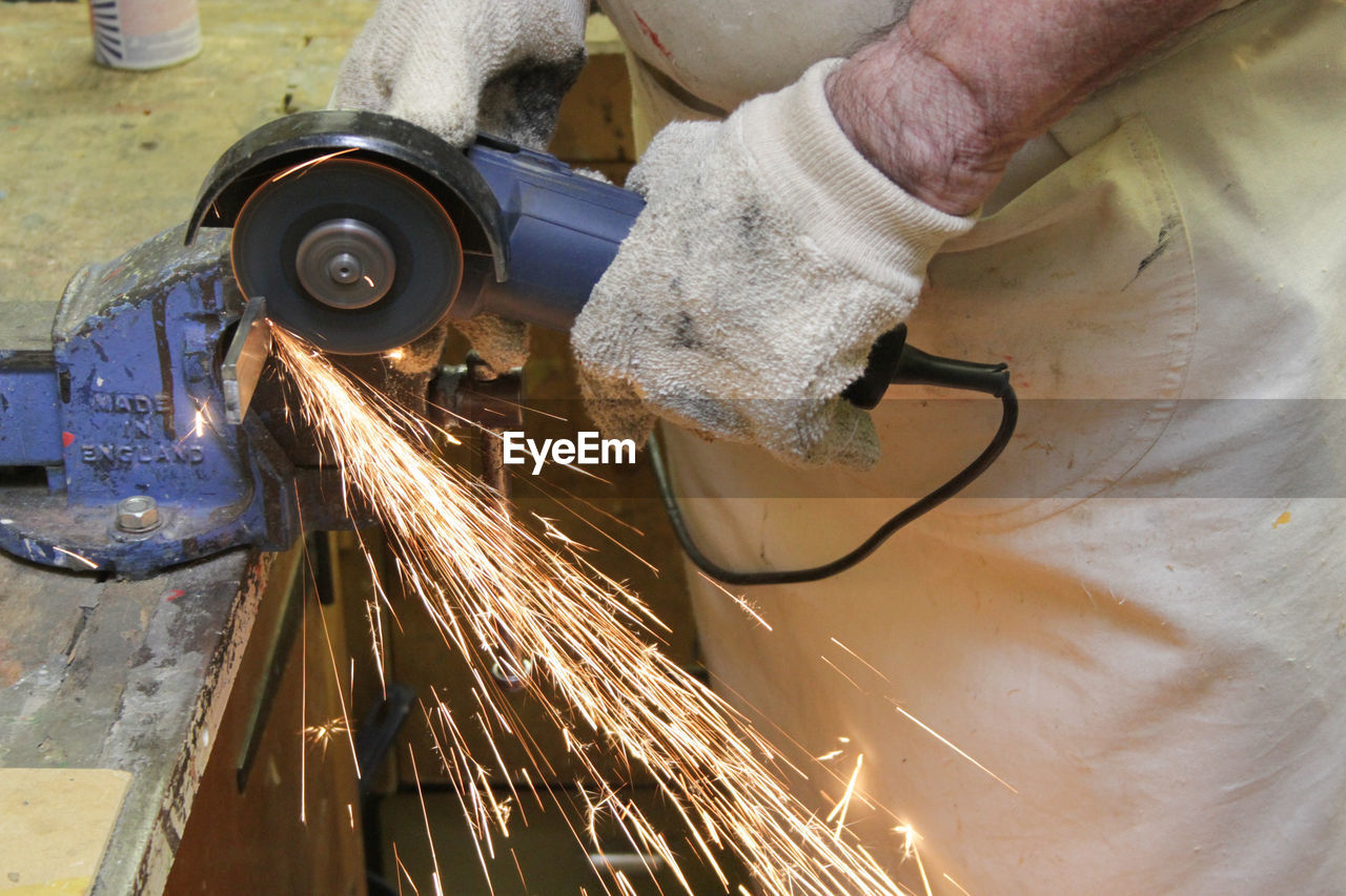 Man cutting metal factory