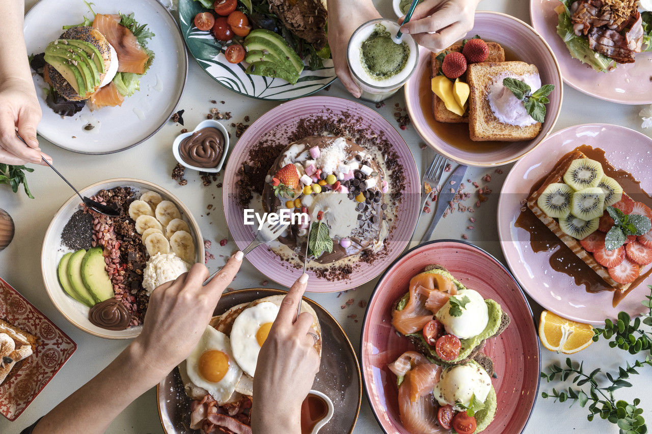 Brunch choice crowd food concept. family breakfast or brunch served on a table. aerial view.