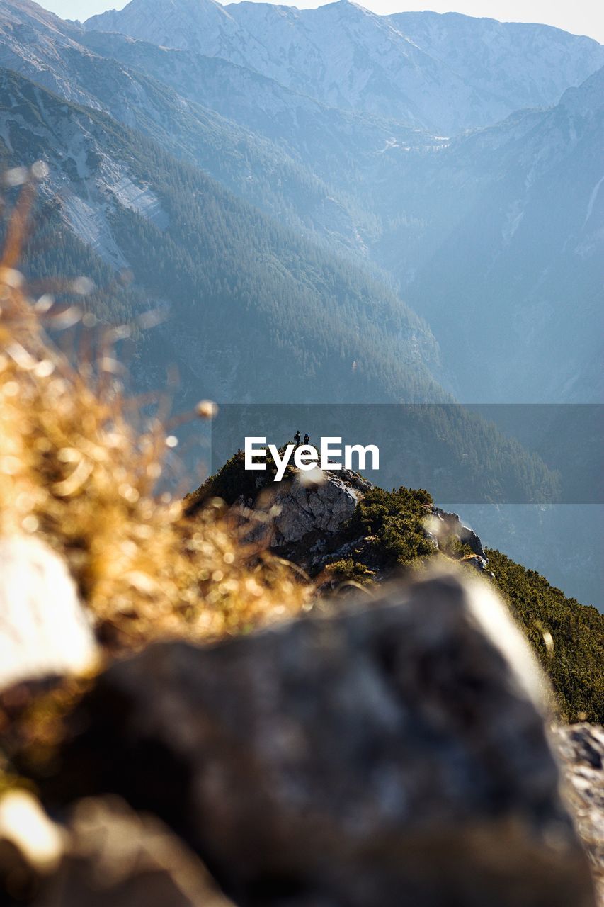 Rocks on mountain against sky