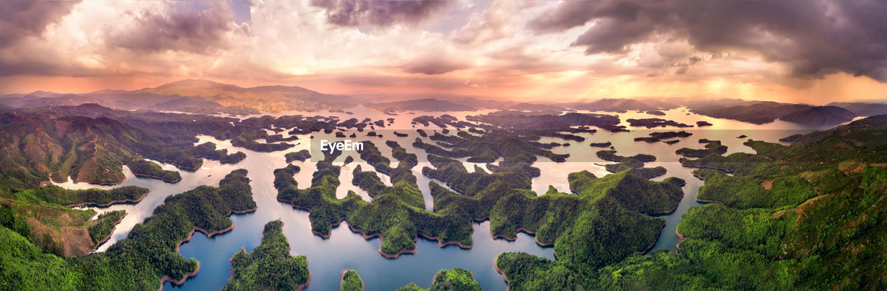 Panoramic view of mountains against sky during sunset