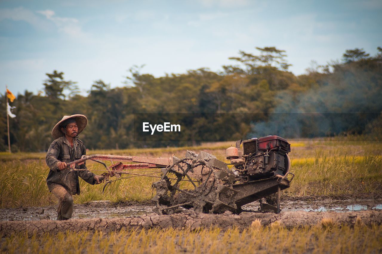 Man working on field