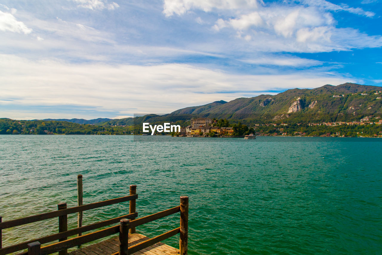 Scenic view of bay against sky