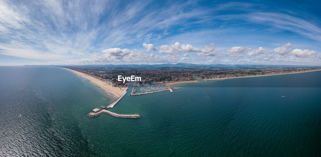 Panoramic view of rimini, its sea, its beaches and its port on the romagna riviera in post-pandemic 