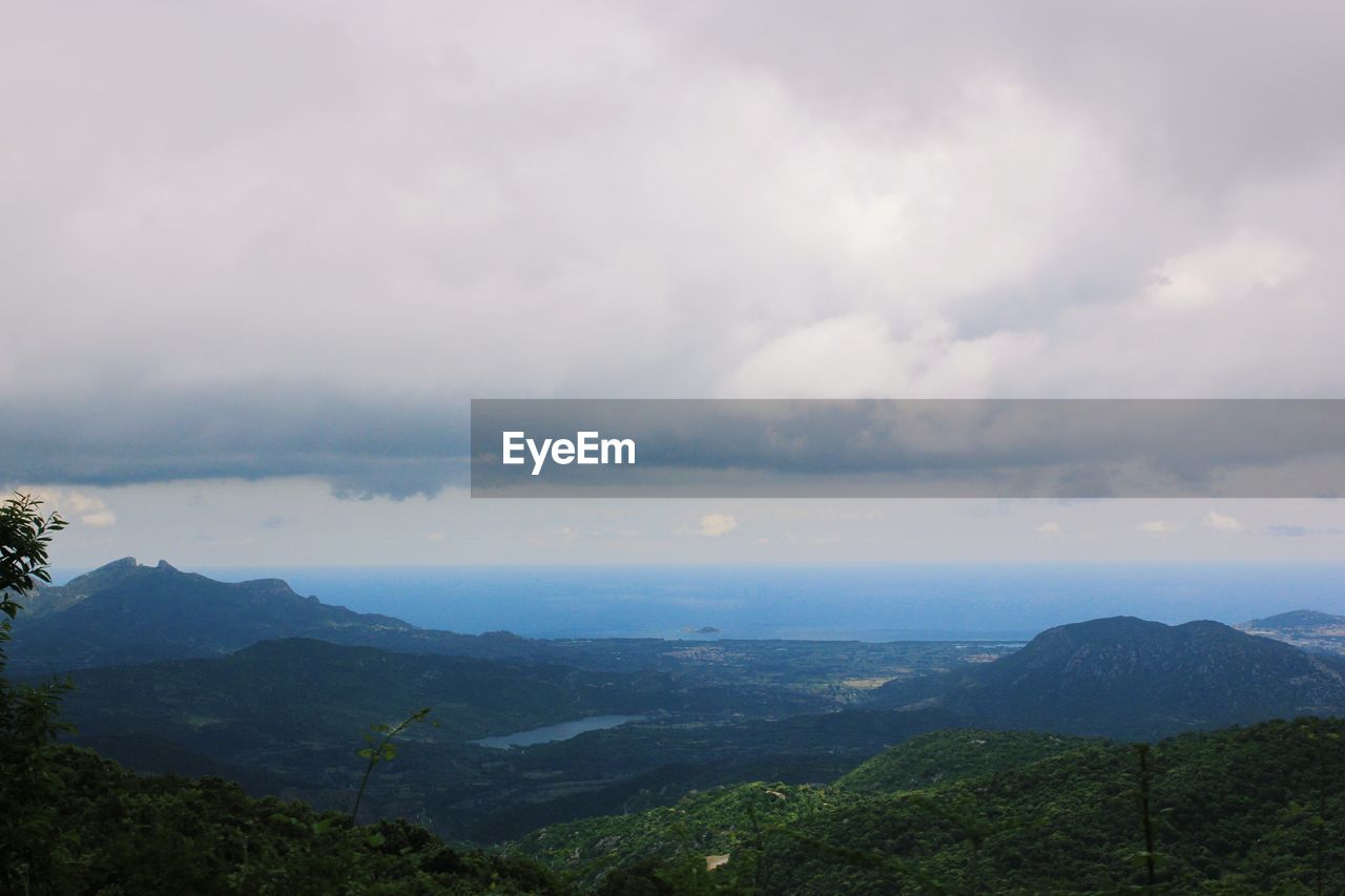 SCENIC VIEW OF MOUNTAIN AGAINST SKY