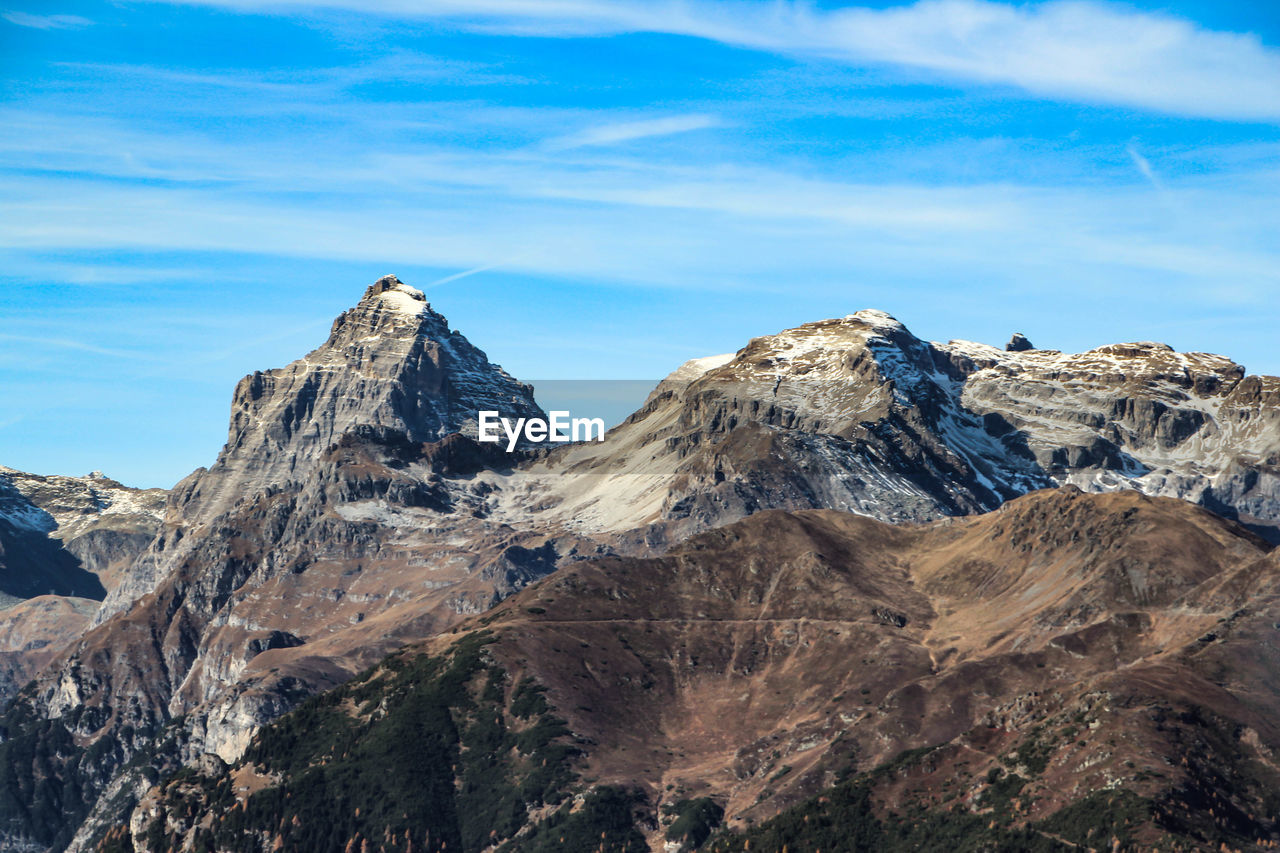 Rocky mountains against blue sky