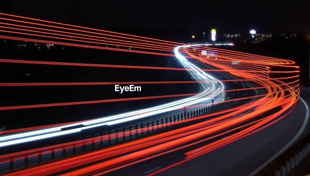Light trails on road at night