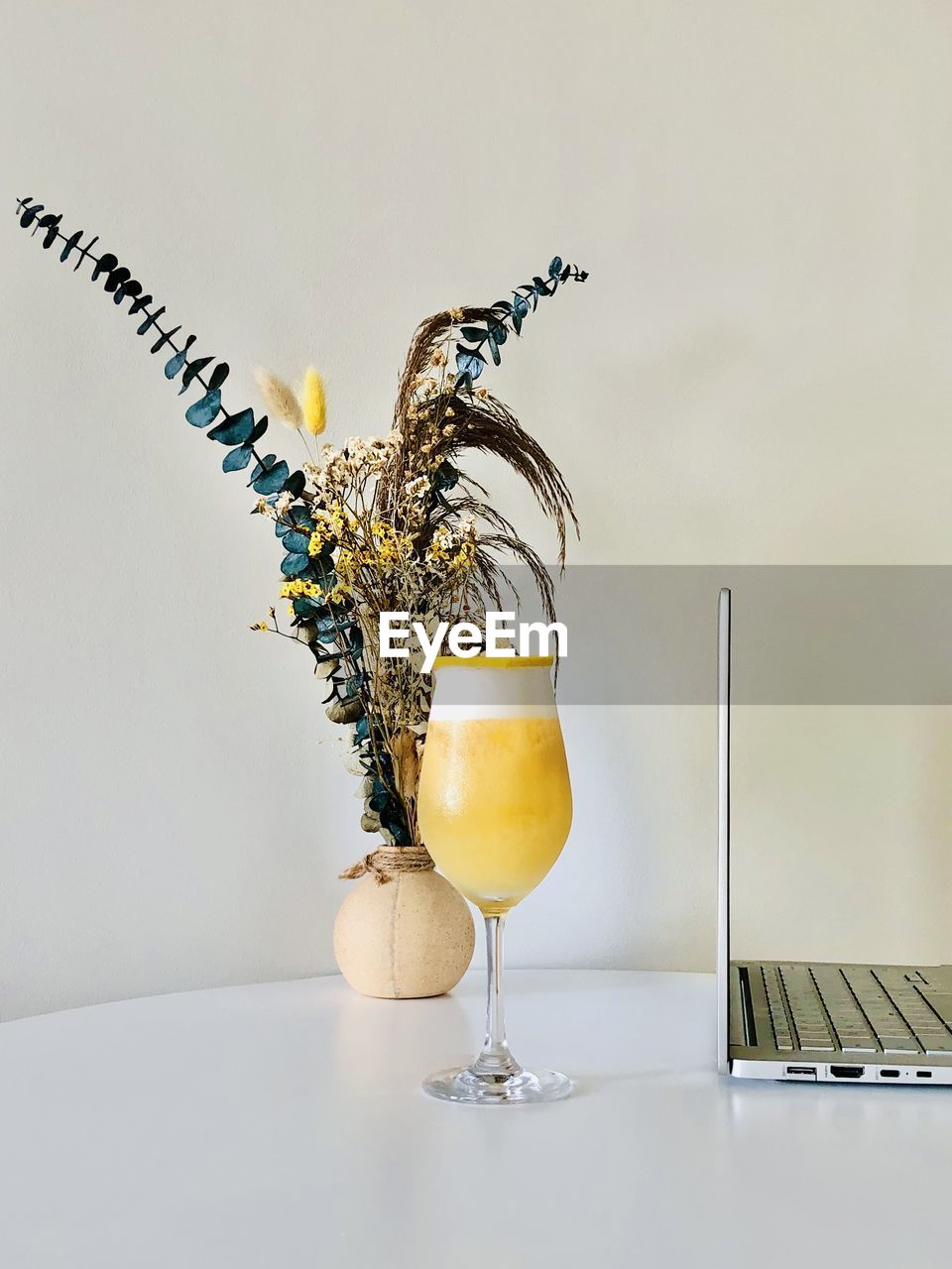 food and drink, glass, drink, indoors, refreshment, no people, table, yellow, food, drinking glass, studio shot, household equipment, lighting, alcohol, still life, nature, fruit, copy space