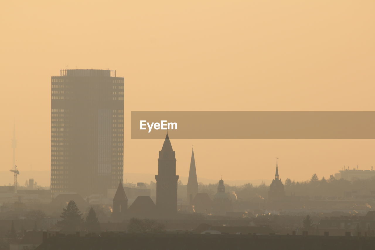 View of cityscape at sunset