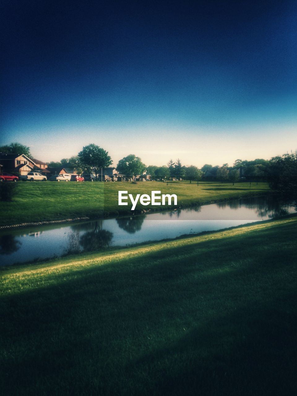 SCENIC VIEW OF LAKE AGAINST CLEAR SKY