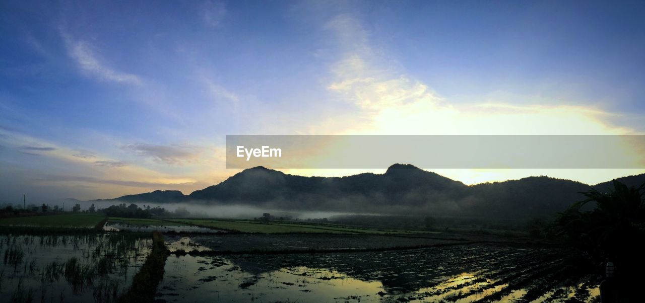 Scenic view of mountains against sky