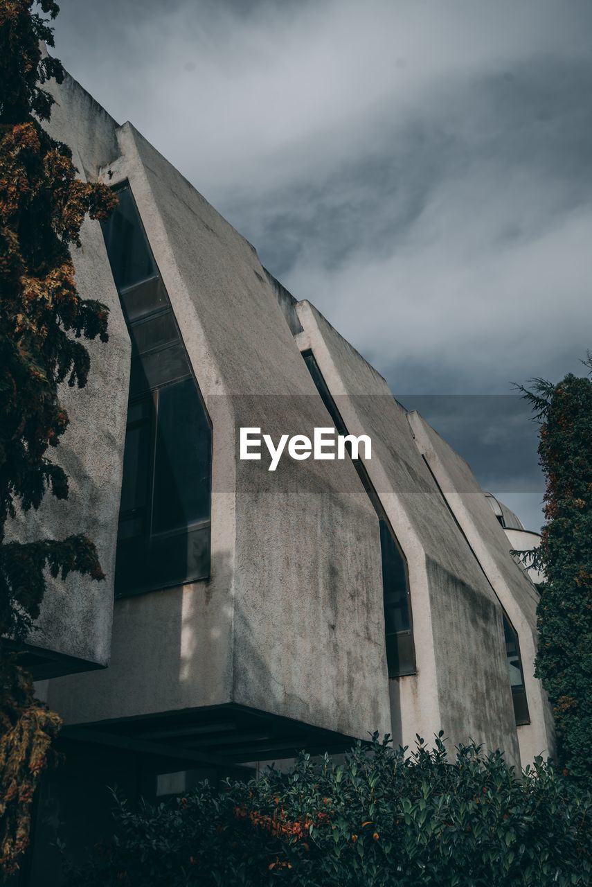 Low angle view of old building against sky