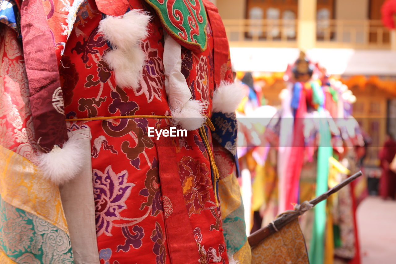 Clothes drying on display in city