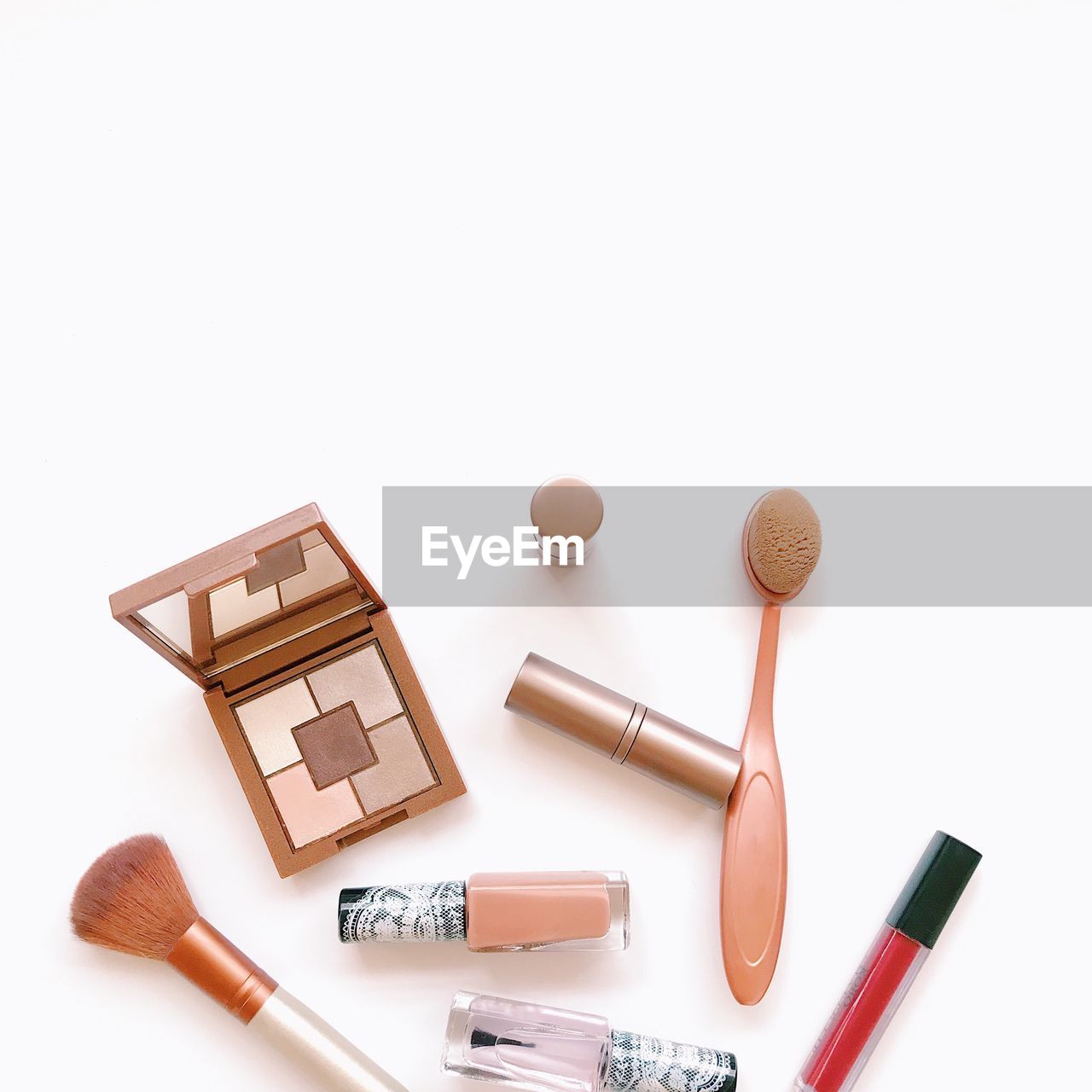 High angle view of beauty products against white background