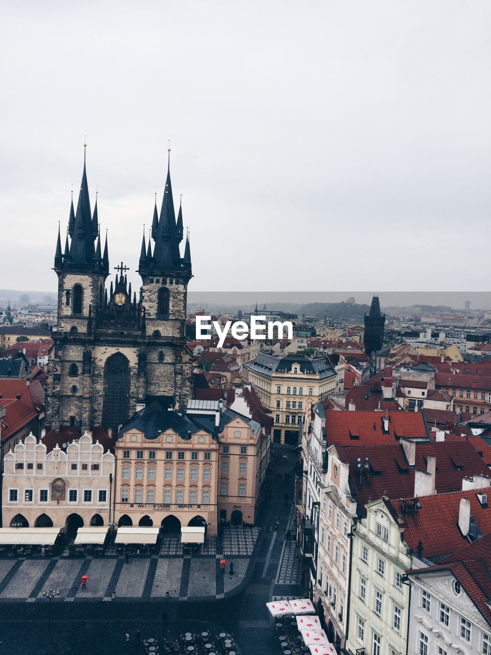 Church of our lady before tyn and cityscape against sky