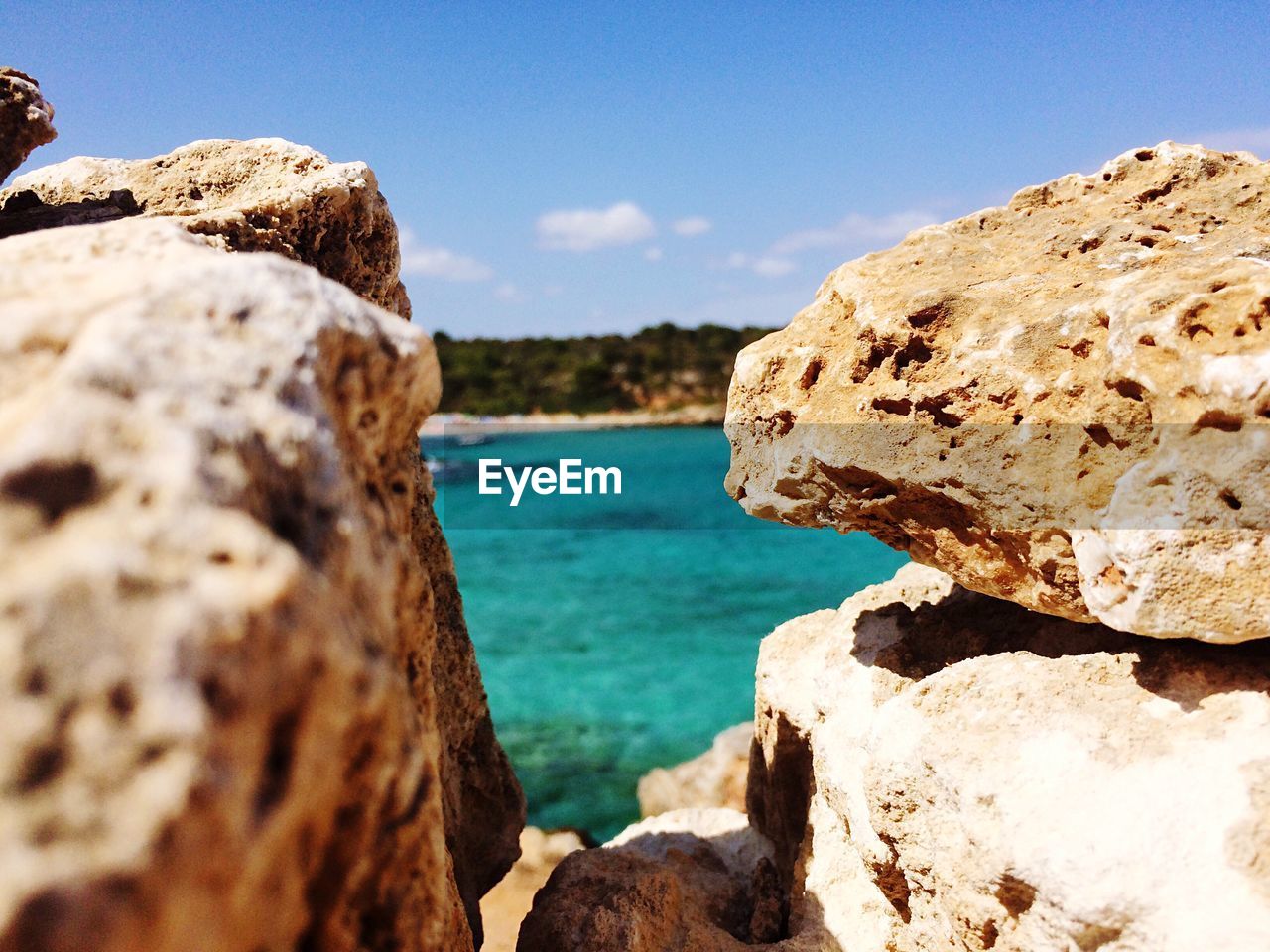 ROCK FORMATION BY SEA AGAINST SKY